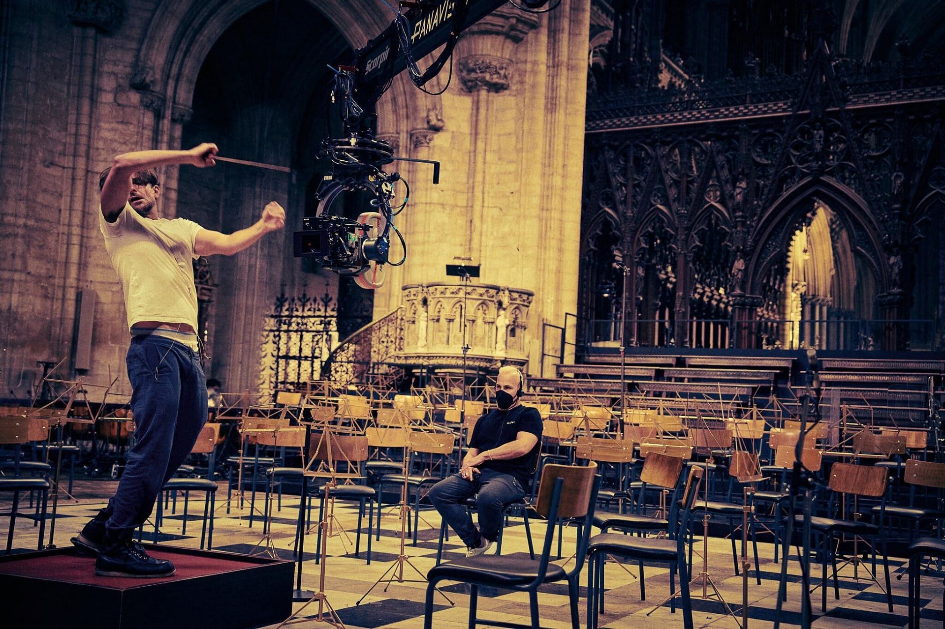 Cooper with Yannick Nézet-Séguin, rehearsing for his role (image via Netflix)
